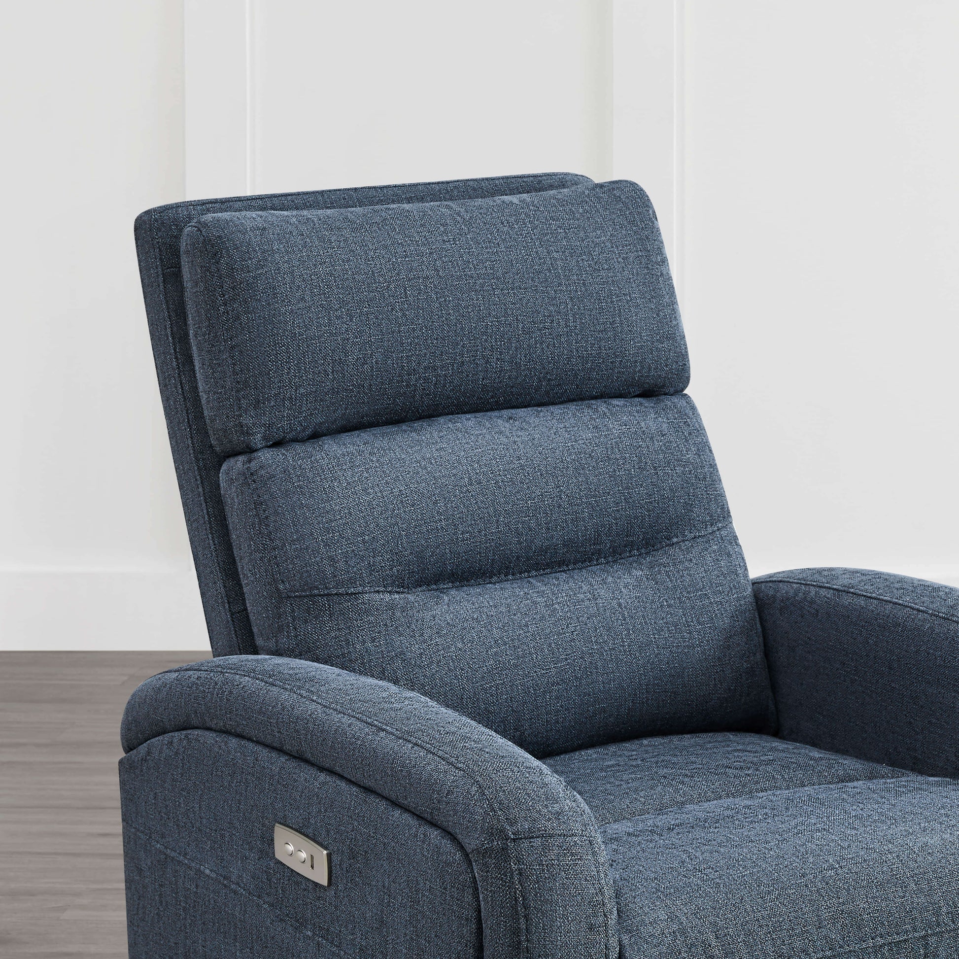 Close-up of dark blue Theo Power Swivel Glider Recliner showcasing plush cushions and headrest - CHITA Living