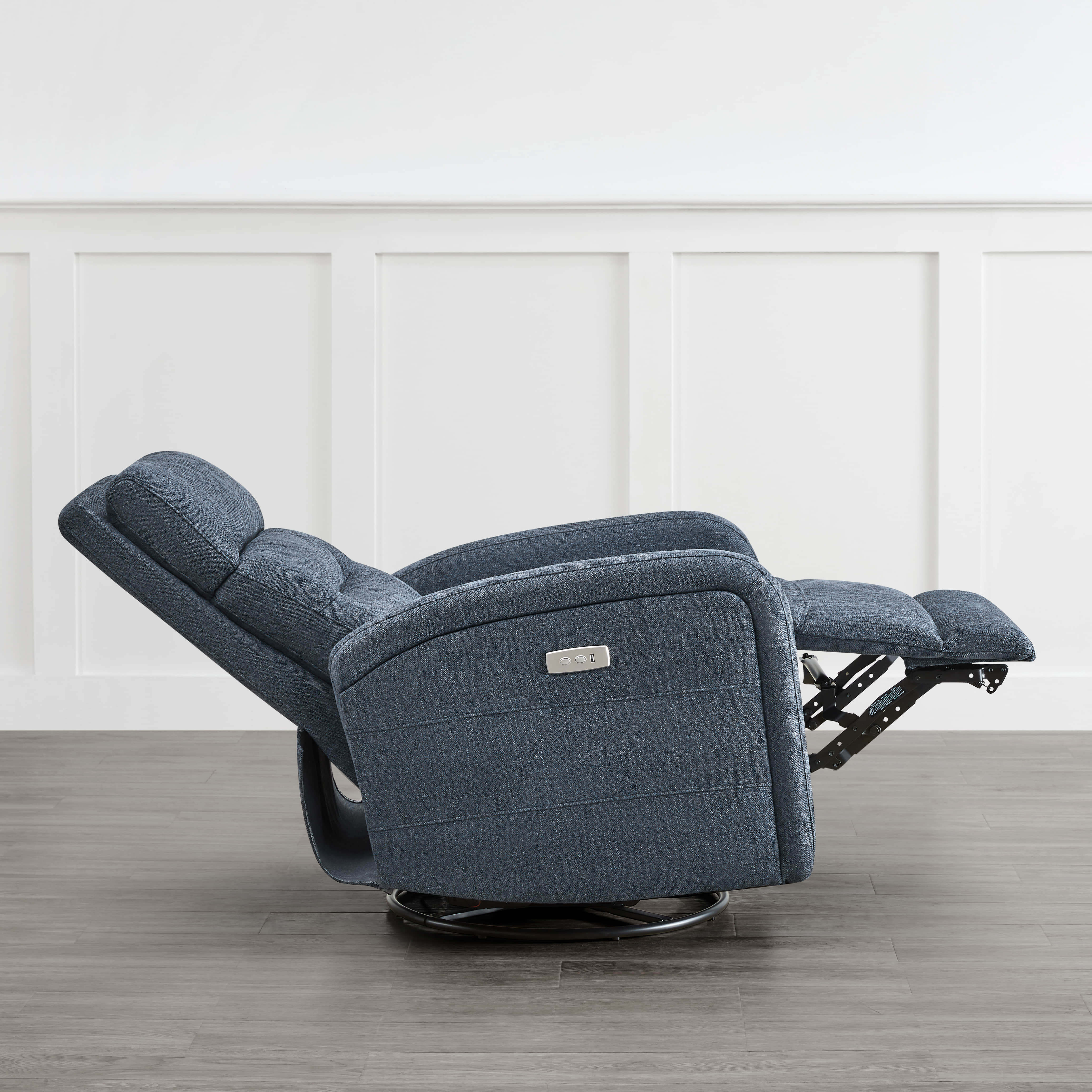 Dark blue Theo Power Swivel Glider Recliner in side view, featuring a reclined position and extended footrest - CHITA Living