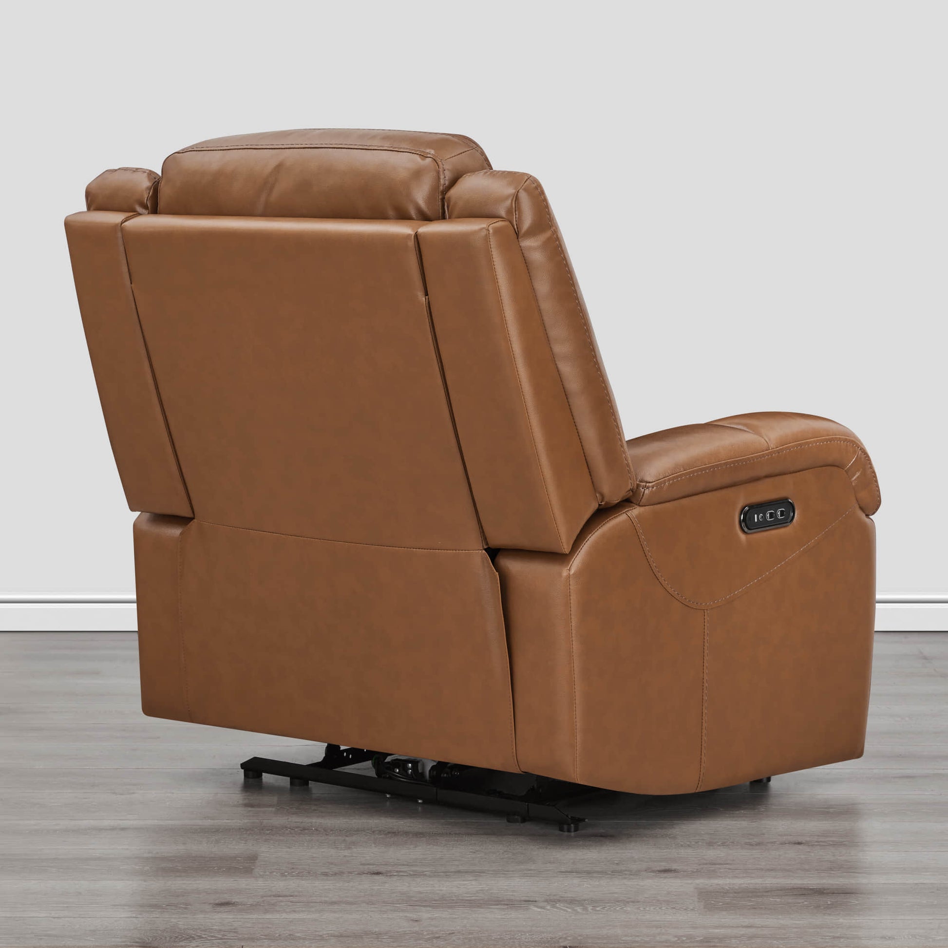 Brown leather Isaac Wall Hugger Power Recliner from the back with power controls - CHITA Living