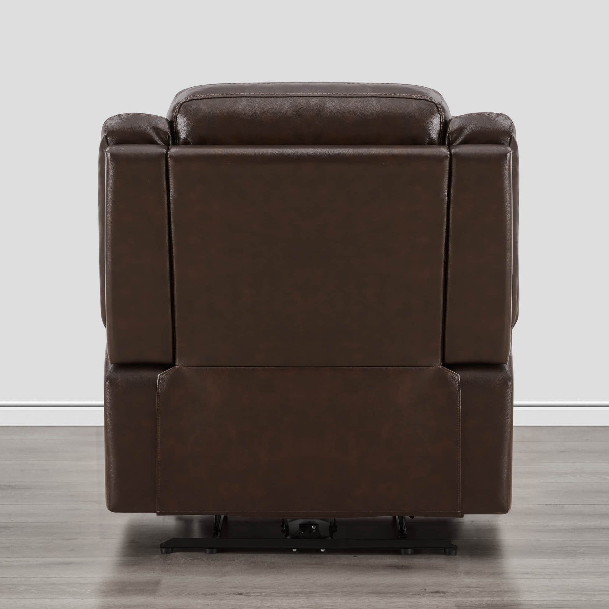 Back view of Isaac Wall Hugger Power Recliner in warm brown leather, highlighting design - CHITA Living