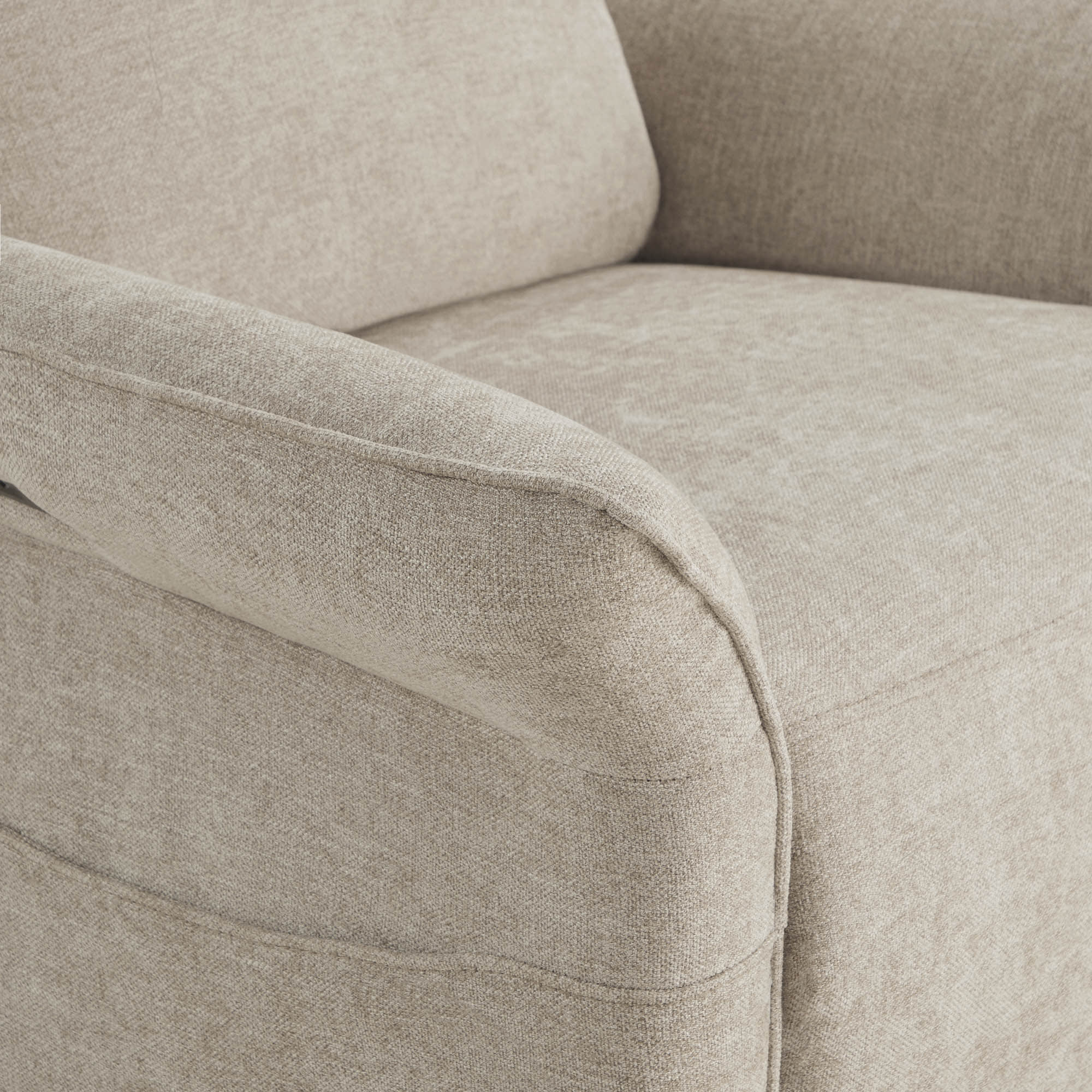Close-up detail of power recliner's armrest showing quality fabric texture.