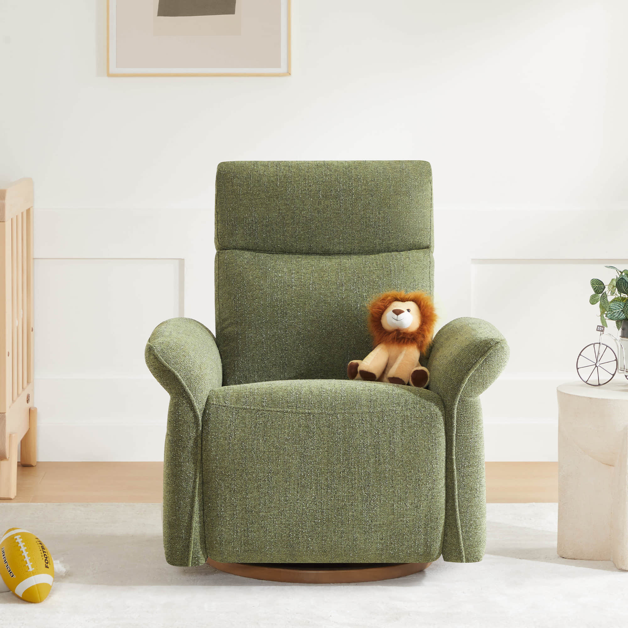 Olive green swivel recliner positioned beside decorative side table in living room.