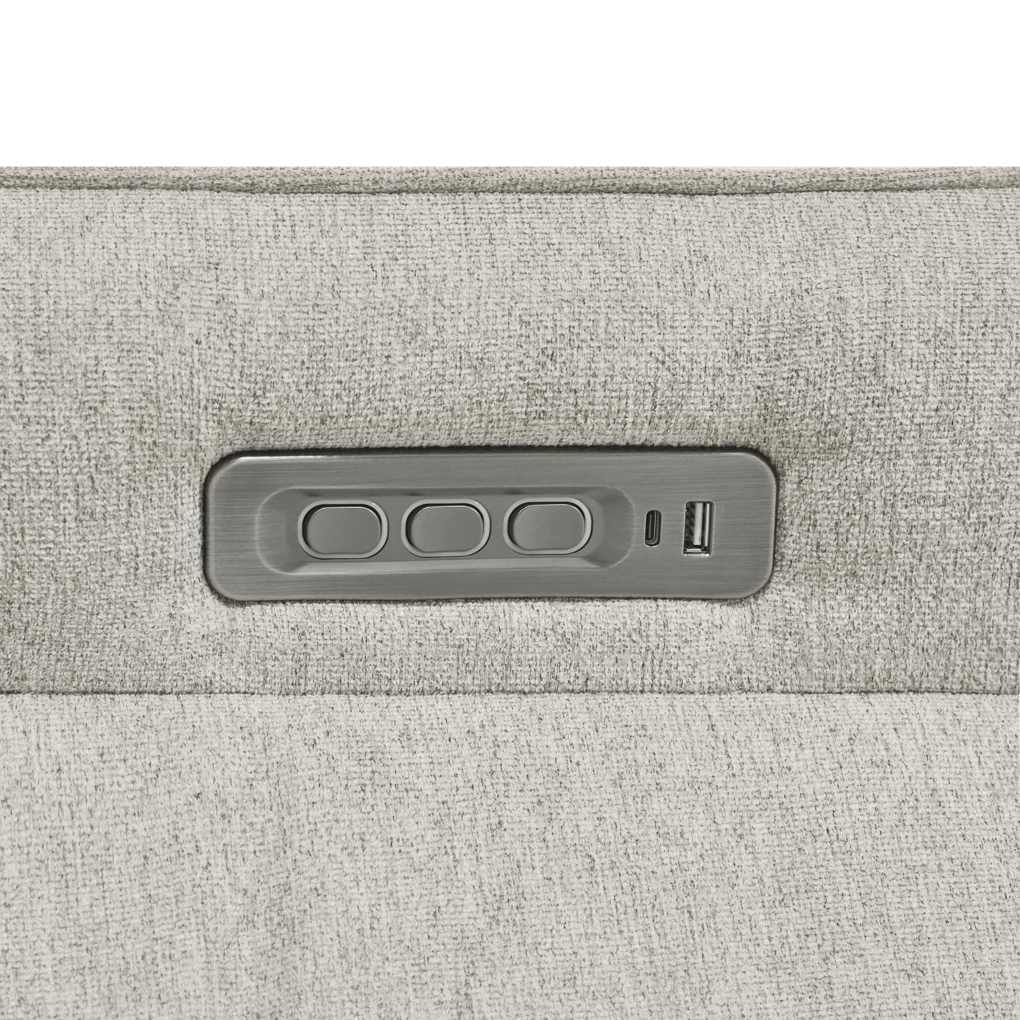 Detail of power recliner control panel with convenient electronic adjustment buttons.