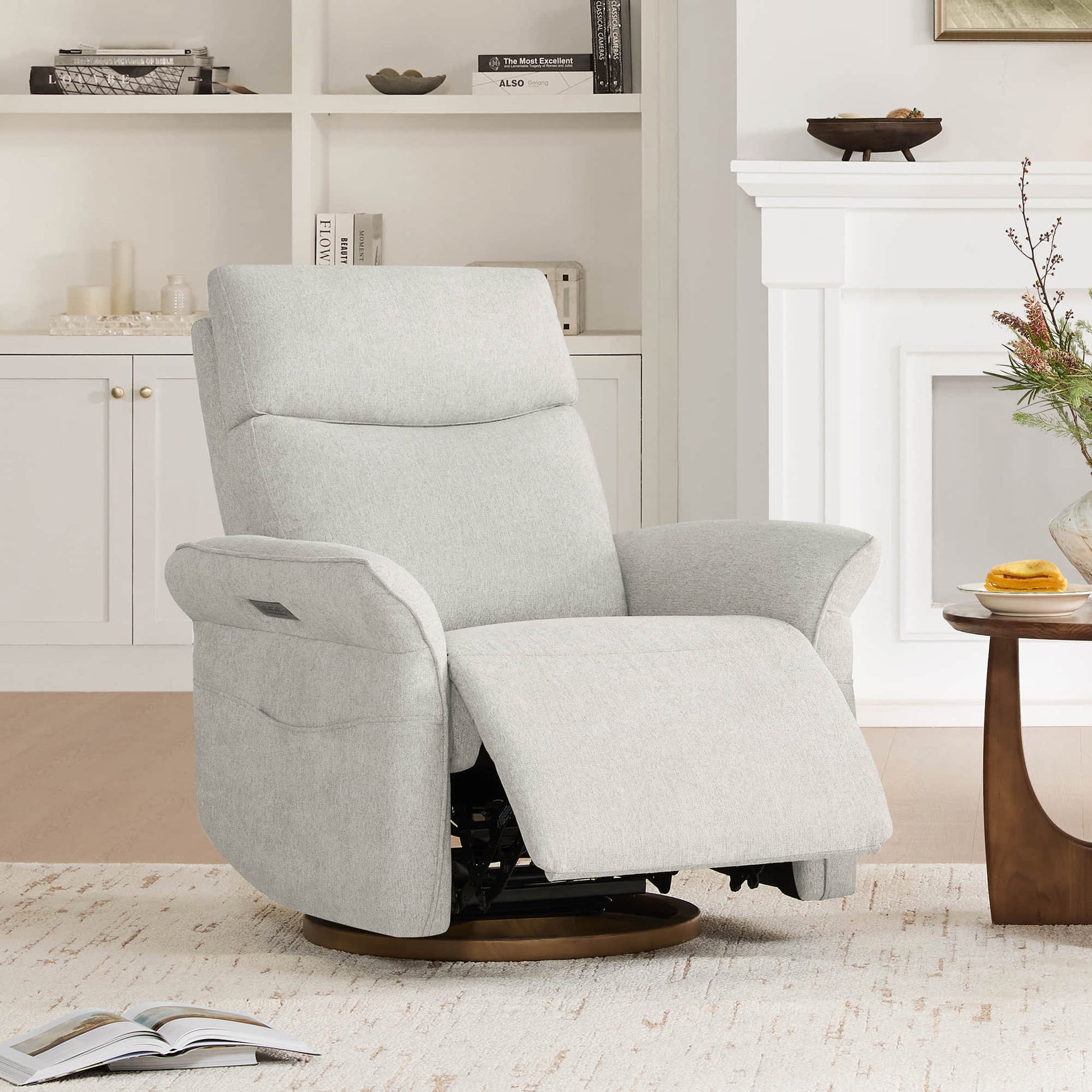 A cream power recliners arranged in stylish living room with neutral decor.