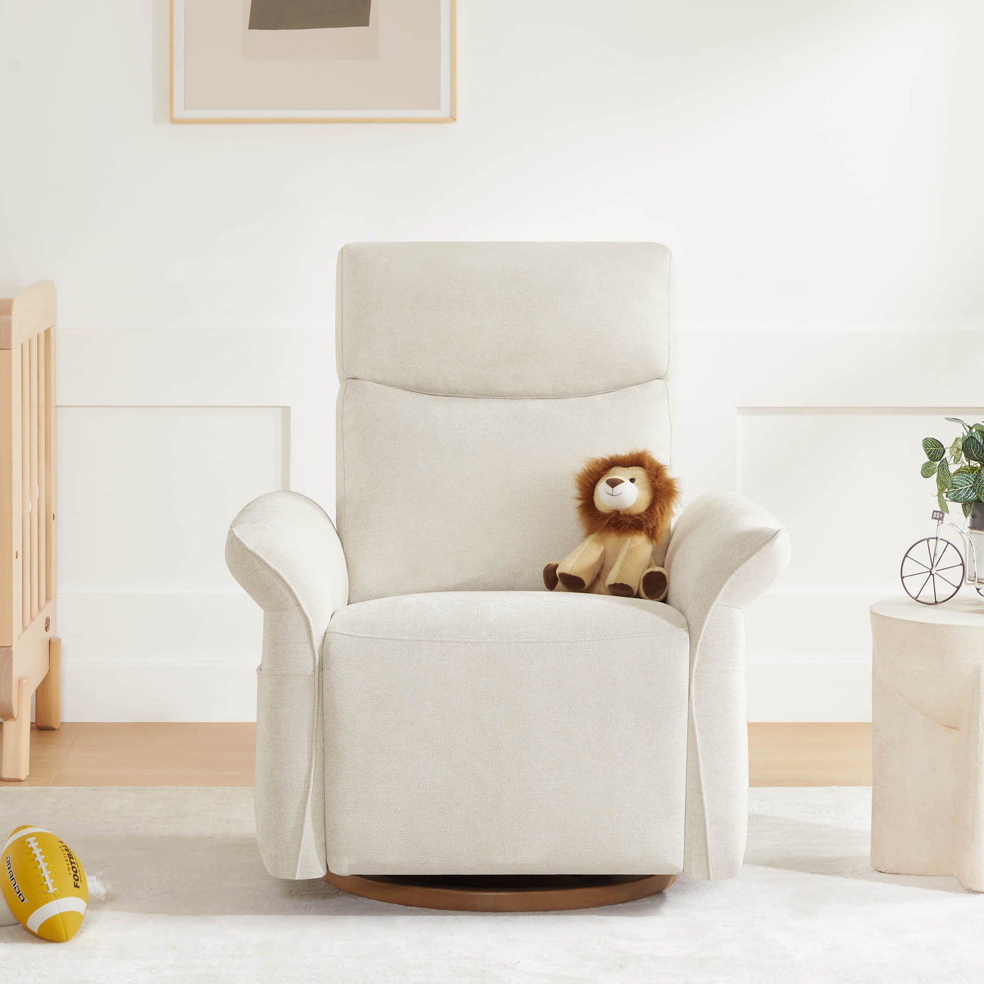 Elegant white swivel recliner positioned in minimalist home interior.