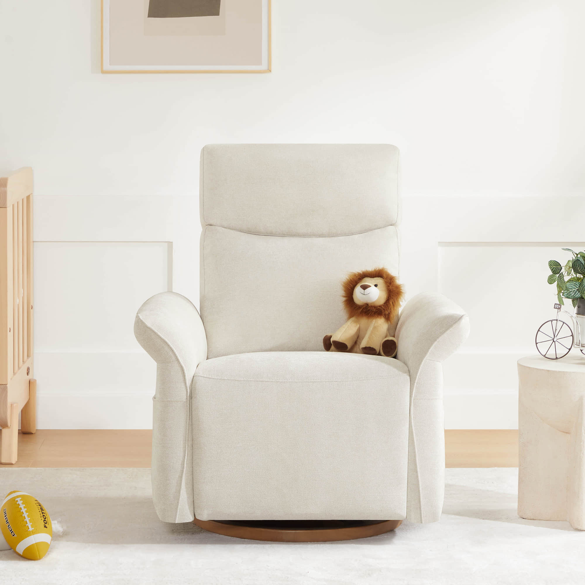 Elegant white swivel recliner positioned in minimalist home interior.