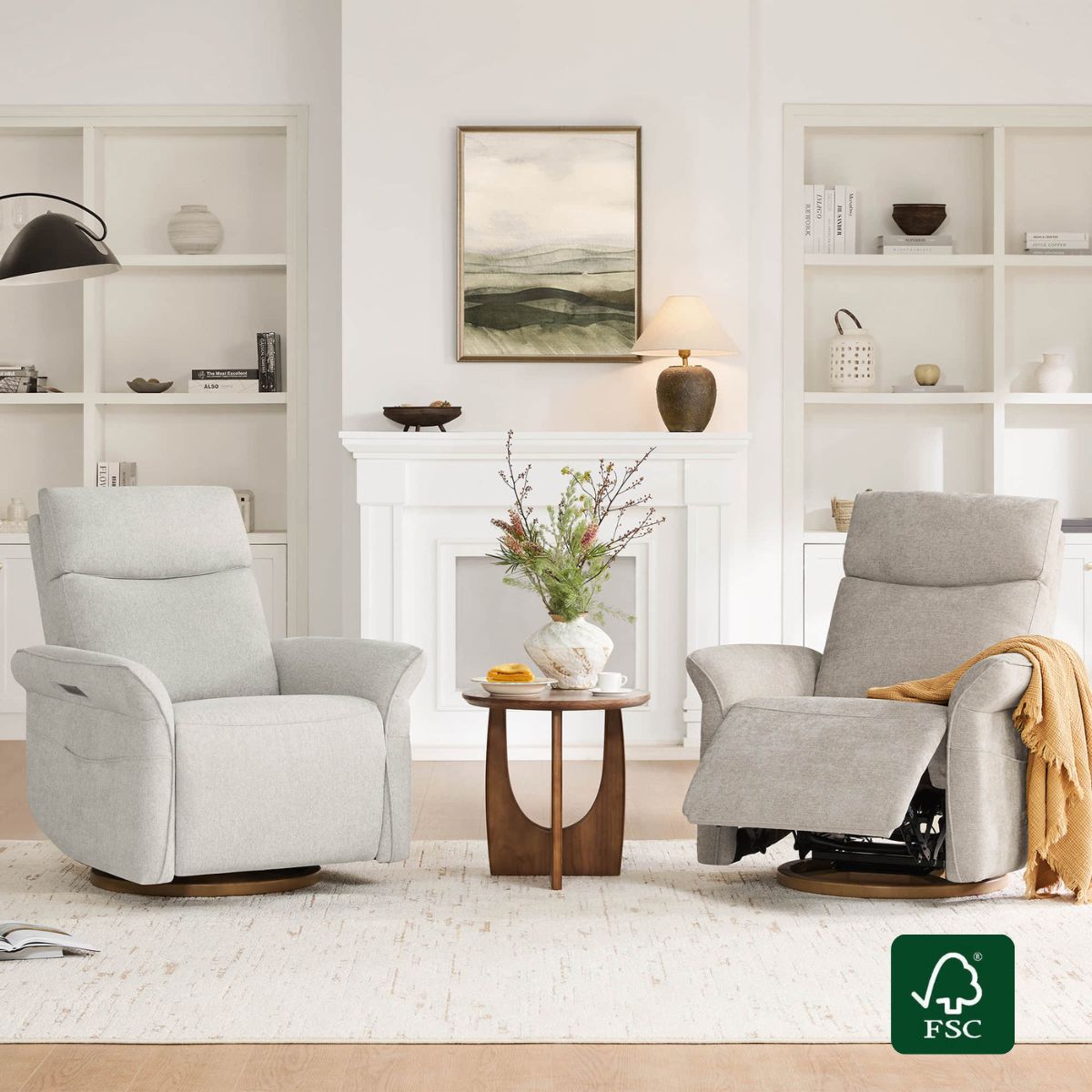 Two swivel recliner chairs, light & dark grey, lifestyle view in living room. 