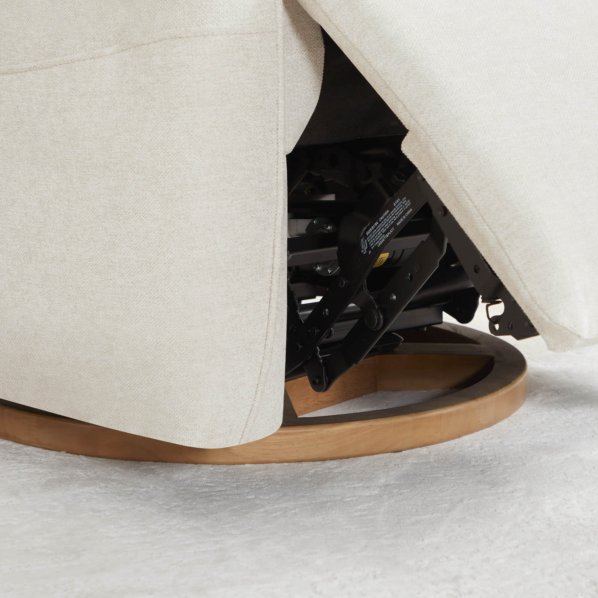 Black mechanism base of power recliner revealing quality engineering components.