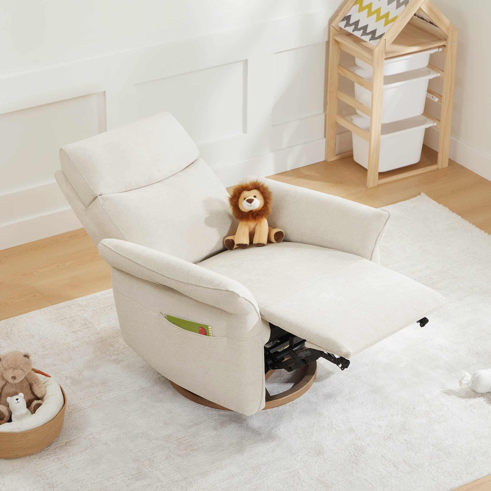 Side angle of a white power recliner with footrest extended showing reclining function.
