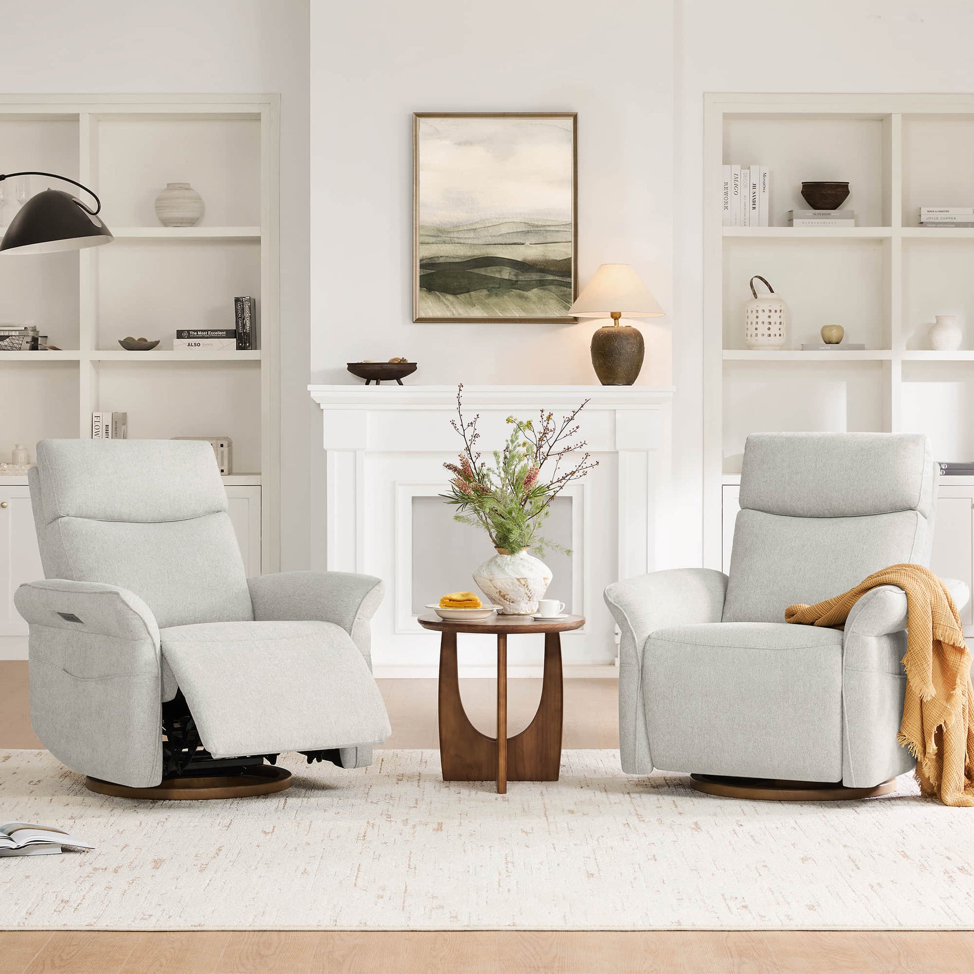 Pair of elegant cream power recliners creating symmetrical living room layout.