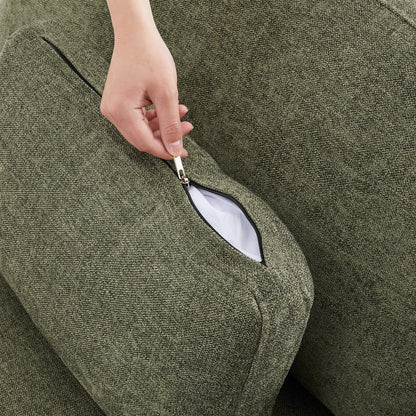 Hand unzipping cushion cover of olive green Delaney Modular Sectional sofa - CHITA Living