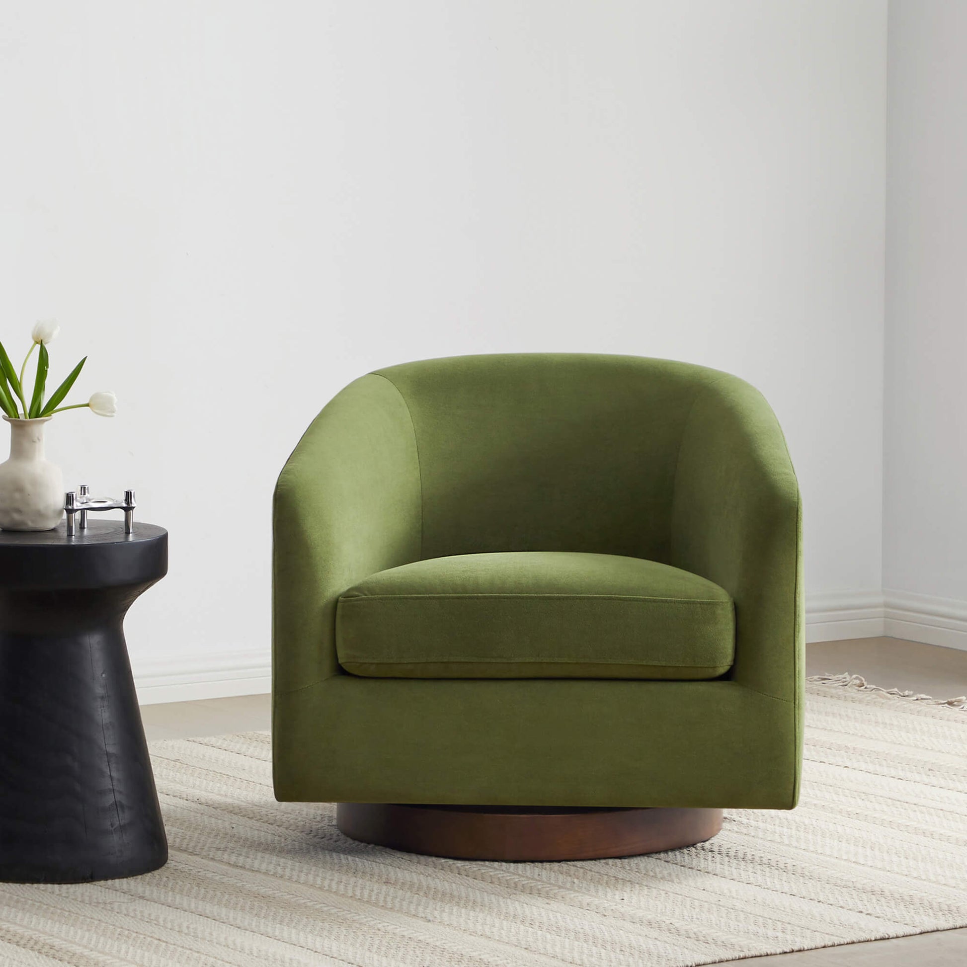 Green Wren Modern Swivel Accent Chair with round base in minimalist living room decor - CHITA Living