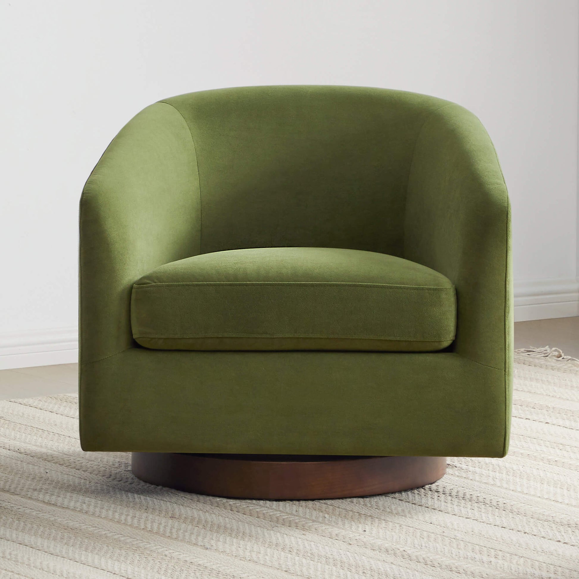 Green Wren Modern Swivel Accent Chair with plush cushion in a minimalist living room - CHITA Living