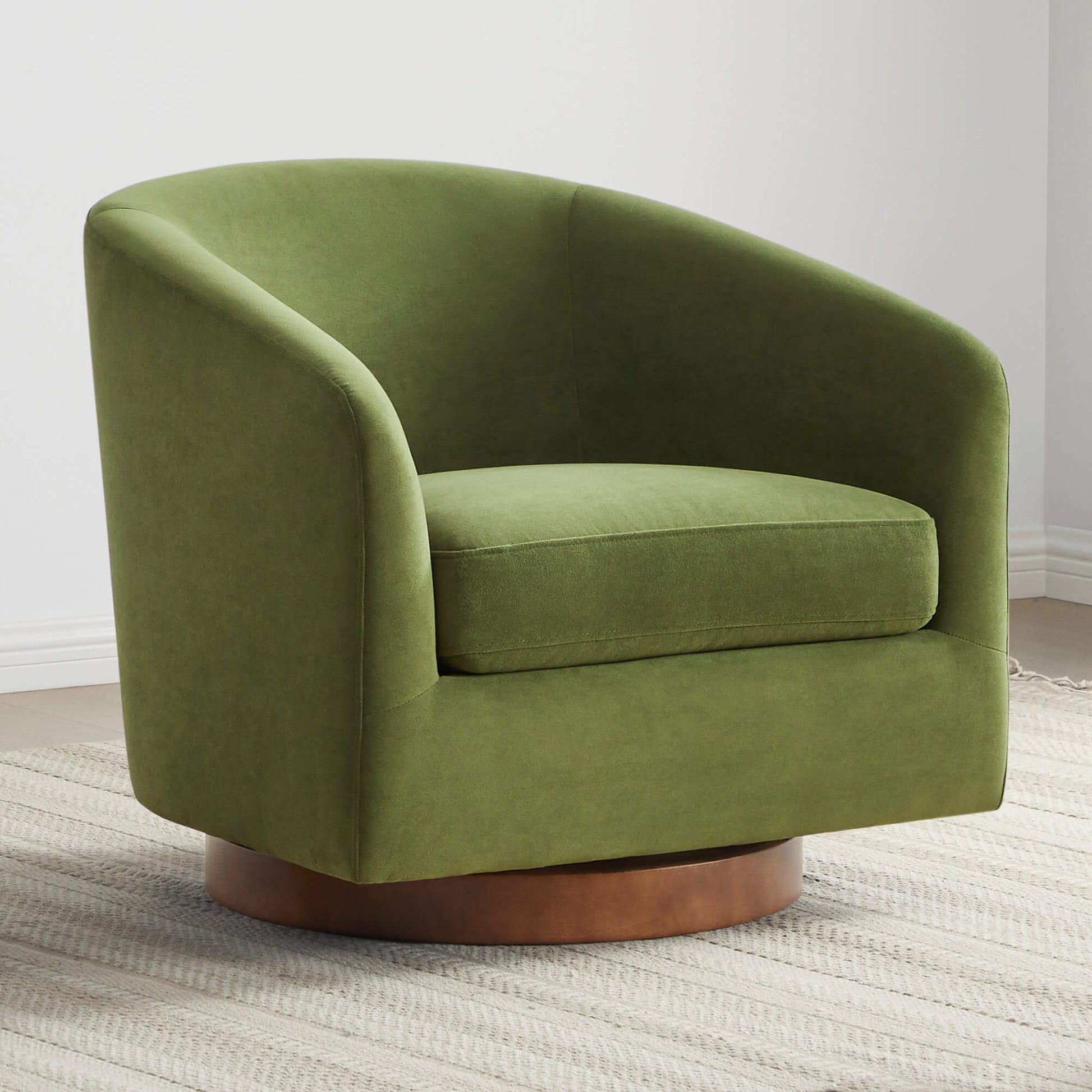 Green Wren Modern Swivel Accent Chair with plush cushion on textured rug - CHITA Living