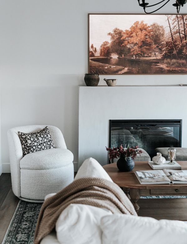 A cozy living room with a white armchair