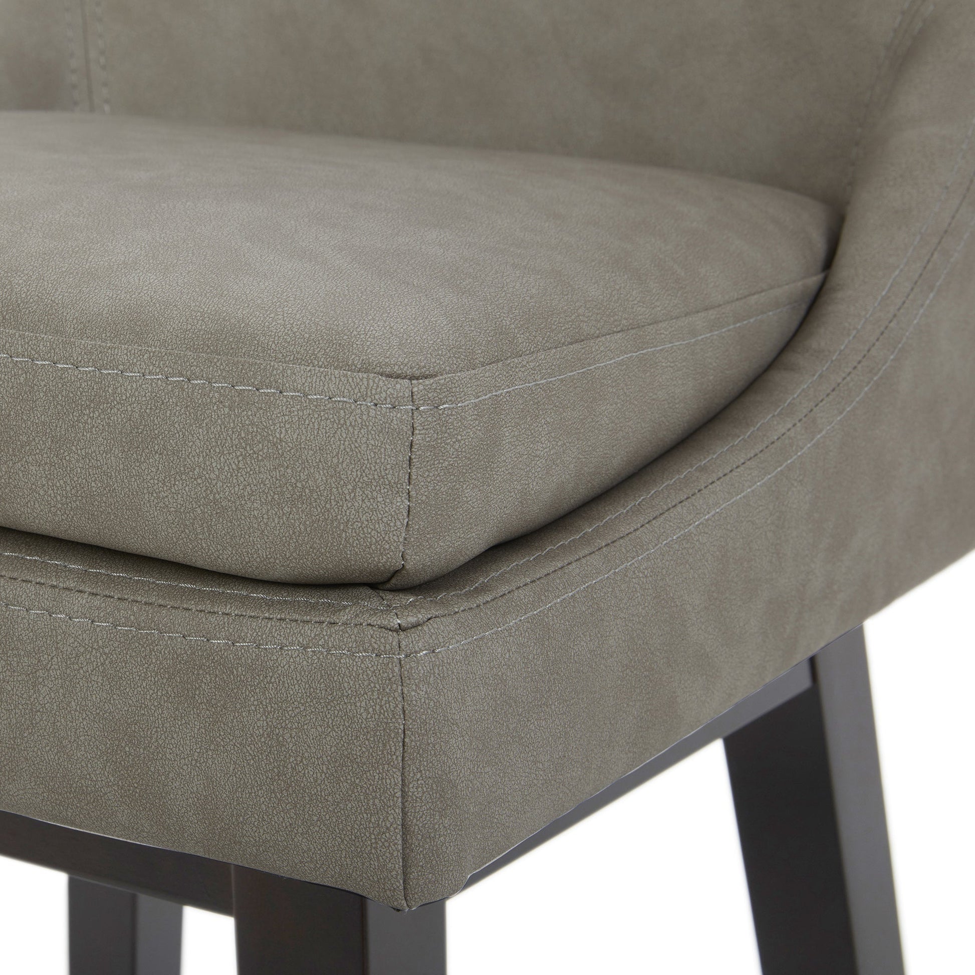 Close-up of Lissa Swivel Bar Stool featuring soft grey leather seat and durable black legs - CHITA Living