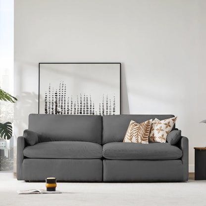 Kenna 2 Seat Modular Sofa in gray, modern living room with decorative pillows, comfortable seating.