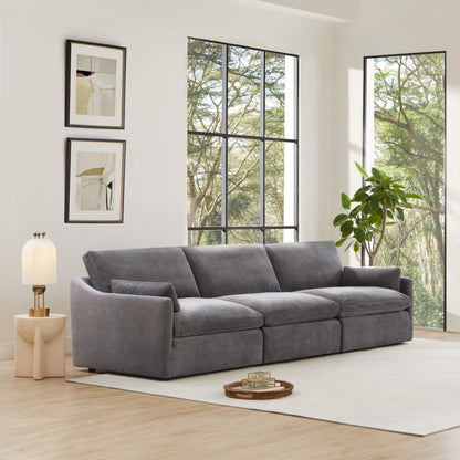 Gray Kenna 3-Seat Modular Sofa in a modern living room with natural light and green view