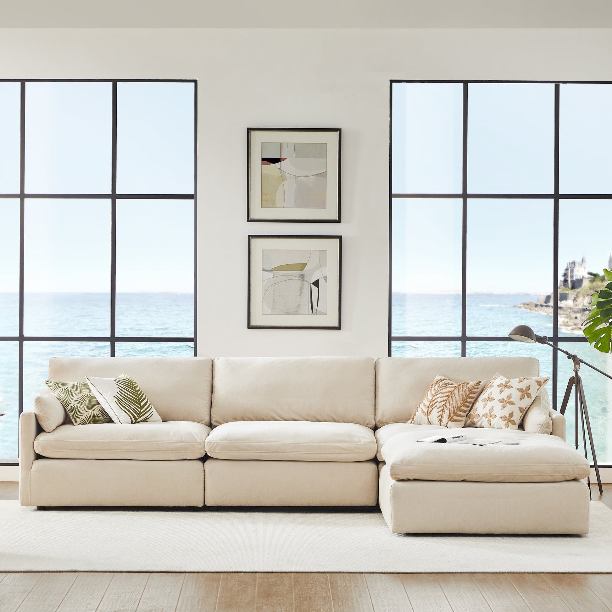 Kenna Modular Sofa-Chaise sectional in cream color, with soft cushions, sea view